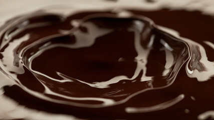 Detail of splashing melted chocolate.