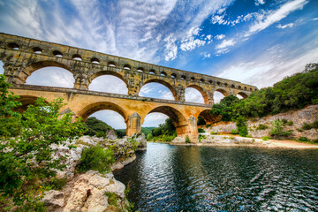 Fototapeta premium The Aqueduct Pont du Gard Crossing the Gardon River, Occitanie, France