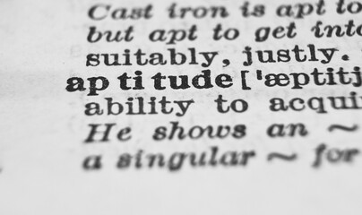 Aptitude dictionary definition close-up. Shallow depth of field.