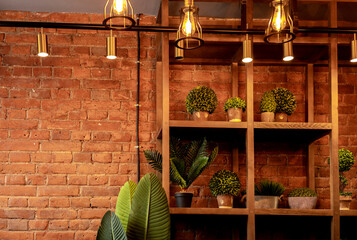Stylish loft interior. Brick wall in a cafe. Copy space