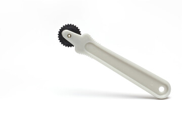 tailor cutting wheel lines fabrics white background