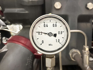 A pressure gauge is a device that measures the pressure of a liquid or gas in a confined space