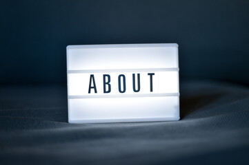 About word written on a customizable light panel
