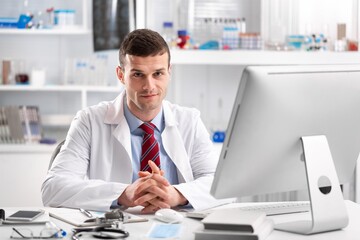 Medical Scientist Working in Science Laboratory on Personal Computer Virus Analysis Software . Scientists Developing Vaccine, Drugs and Antibiotics.