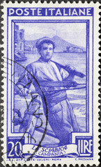 Italy - circa 1950: a postage stamp from Italy showing a Fisherman, Vesuvius (Campania)