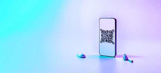 Qr code payment. Digital mobile smart phone with qr code scanner on smartphone screen for pay, scan barcode technology on neon background. Online shopping, cashless society technology concept.