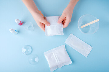 Step by step instruction: how to make salt bomb. Concept of DIY and children's creativity and experiences. Step1 preparation ingredients: soda, citric acid, dyes. Handmade natural cosmeti