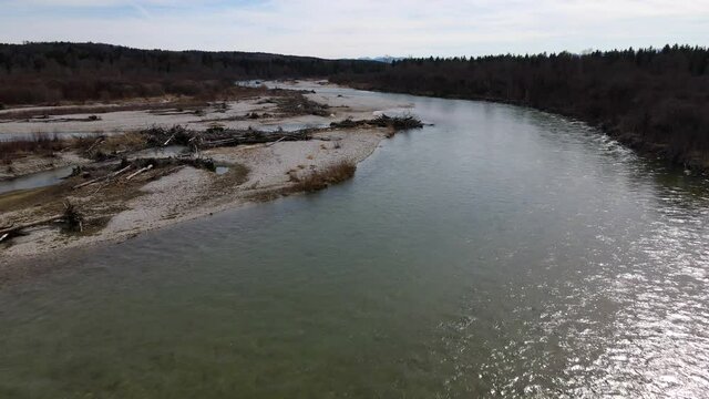 Isar, wild river near Munich and Wolfratshausen, Aerial drone shot in 4k, gravel bank, driftwood