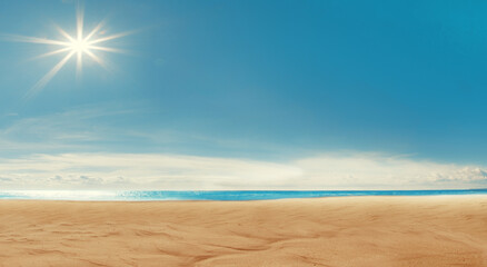Beach background. Blue sky, the sea, the sun shining. Spa resort. Sand, ocean and rest. Vacation on a paradise island. Tourism.