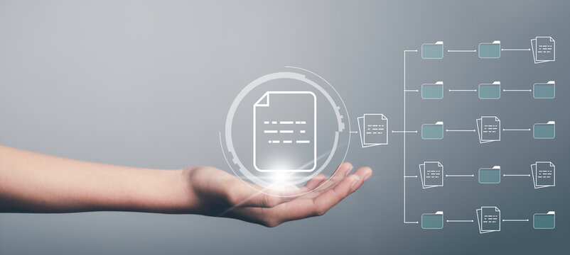 Document Management System (DMS) Concept. Hand Hold File Icon Virtual Screen Automation Software To Archiving And Efficiently Manage And Information With ERP. Corporate Business Technology.