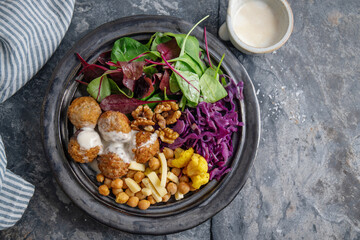 Tasty vegan salad with falafel and chickpea