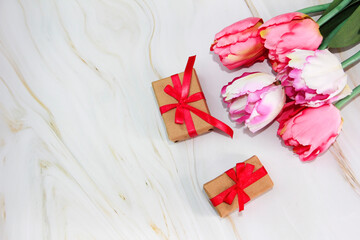pink tulips and gift boxes