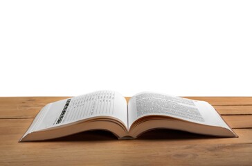 Open reading book on a wooden desk