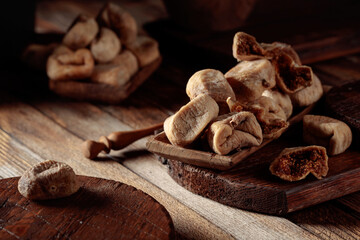 Dried figs on a old wooden table.