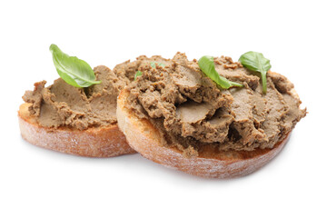 Slices of bread with delicious pate and basil on white background