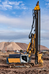 A powerful drilling rig for peeling at a construction site. Operation of the drilling rig in...