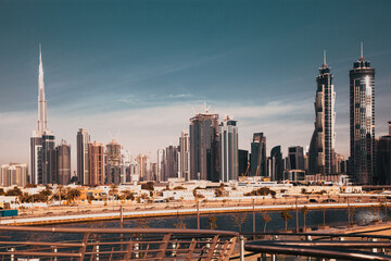 Naklejka premium Dubai, UAE - FEBRUARY 2018: Dubai Downtown skyscrapers as viewed from the Dubai water canal.