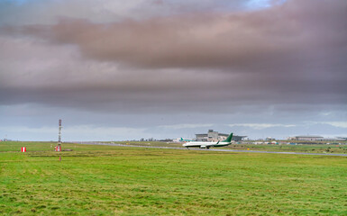 Fototapeta na wymiar Airplane on the runway in the airport