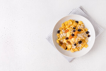 Healthy breakfast, diet culture. Fresh granola, muesli with raisins. Copy space
