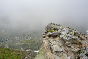 Alpine mountains in Austria. Grosglockner road in fog
