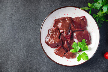 raw liver pork, beef offal meat healthy meal food snack on the table copy space food background...