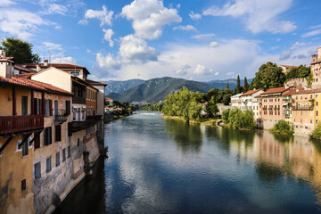 Fototapeta na wymiar Title: View along the Brenta River in Bassano del Grappa, Italy.