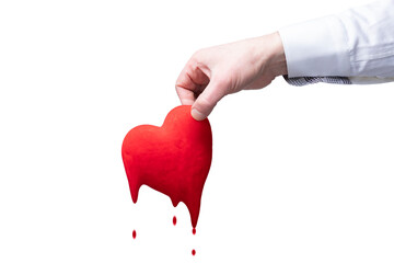 a man's hand holds a red heart on a white isolate background. blood dripping dripping drops throws out a heart symbol of love. separation or breakup discord in a relationship