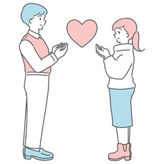 ハートを掲げる仲良しカップル