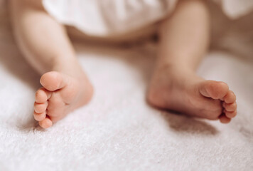 Baby feet.Little kid feet white background.g.Girl feet