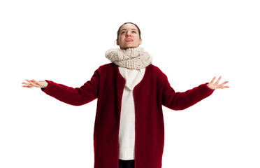 Young girl wearing warm jacket and scafr standing isolated over white studio background. Flu, cold, allergy