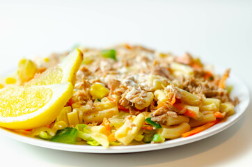 Cavatelli pasta with tuna and iceberg lettuce, carrots, sweet corn and cucumber in a sauce mayonnaise