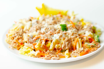 Cavatelli pasta with tuna and iceberg lettuce, carrots, sweet corn and cucumber in a sauce mayonnaise
