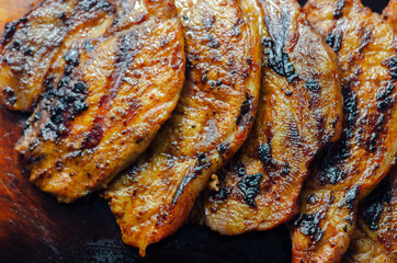 Fresh and juicy pork loin steaks,  grilled meats on the wooden board