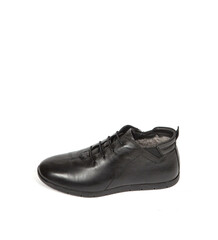 Men black winter leather boots with fur inside isolated on white background