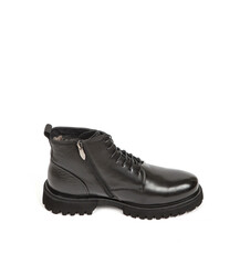 Men black winter leather boots with fur inside isolated on white background