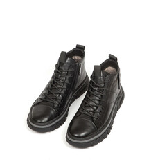 Men black winter leather boots with fur inside isolated on white background