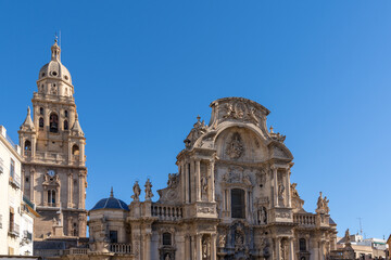 Fototapeta na wymiar close up view of the historic cathedral in Murcia under a cloudless blue sky