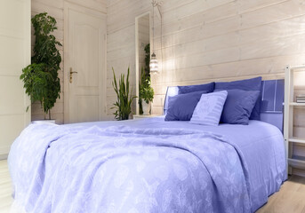 Scandinavian style bedroom interior in trendy colors of the year 2022
