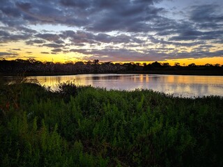 Naklejka premium sunset over lake