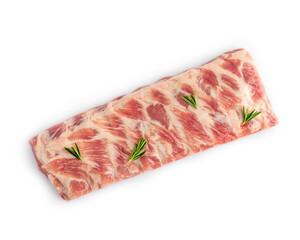 Closeup of raw spare lamb ribs with rosemary on white isolated studio background top view