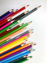 color pencils on a white background