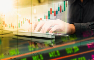 businessman use screen graph monitor for stock investor to finance exchange money currency concept