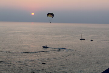 paraglider over the sea