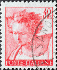 Italy - circa 1961: a postage stamp from Italy showing a work of Michelangelo: Head of the prophet...