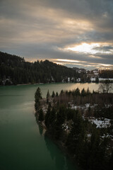 River bend with forest and sunset