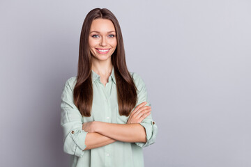 Photo of lovely brunette lady boss crossed arms wear blue blouse isolated on grey color background