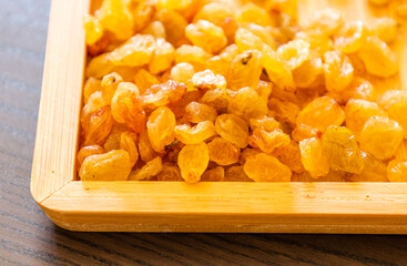 golden raisins close up in bowl