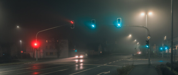 traffic lights in foggy night