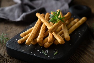 Crispy bread sticks with salt and rosemary