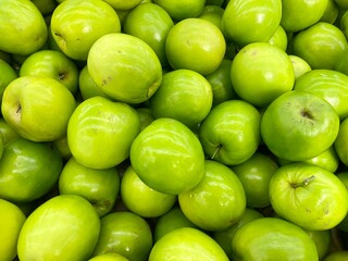 Close-up photo of  Taiwan's big jujube in market. Group of sweet dates fruit background.